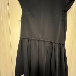 Chic Black Ruffled Dress, brand new . S/M